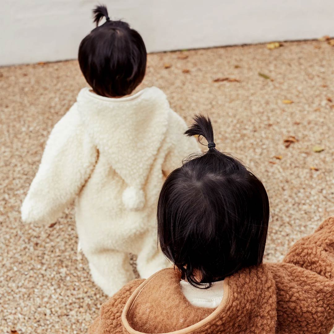 BINIBAMBA Merino Sheepskin Snugglesuit - Milk - Image 6